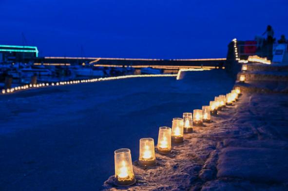 Candles on the Cobb 2022 ©Love Lyme Regis