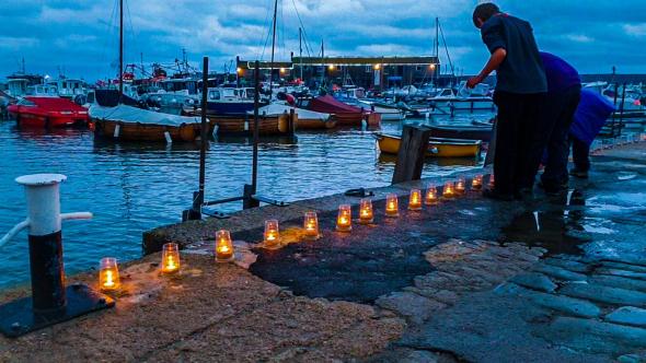 Candles on the Cobb 2018 ©Love Lyme Regis